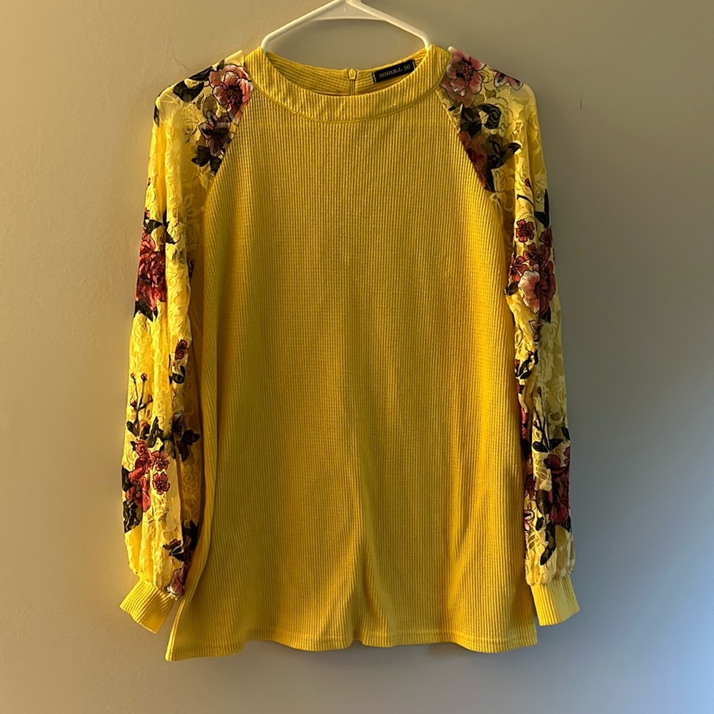 Beautiful yellow blouse with sheer floral sleeves